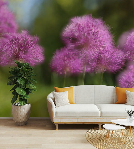 The background is a soft blend of greens and purples.


