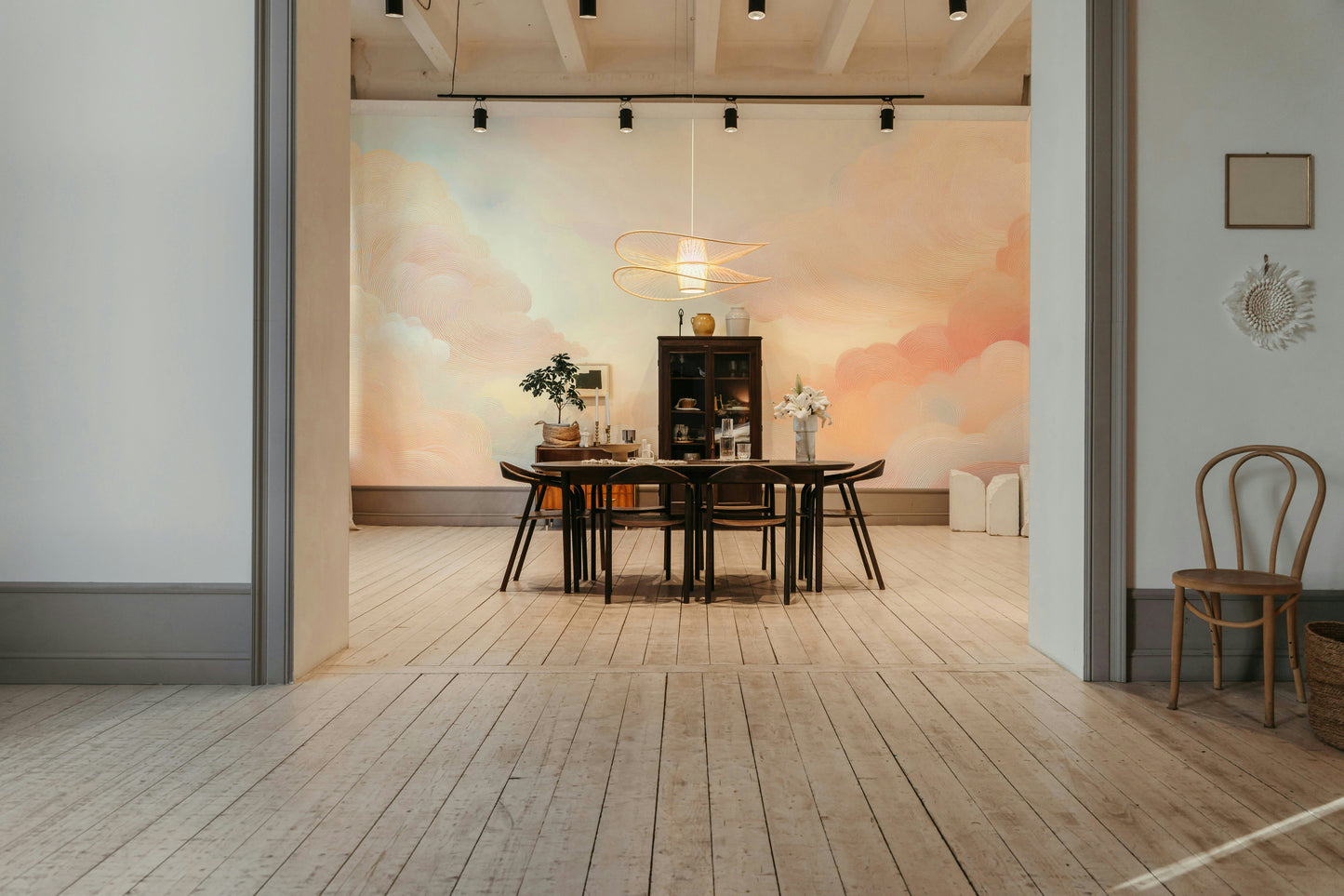 Soft Sky Serenity Wall Mural used as a focal point in a bright open plan living space.