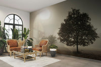 Solitary tree and expansive landscape captured in a wall mural.

