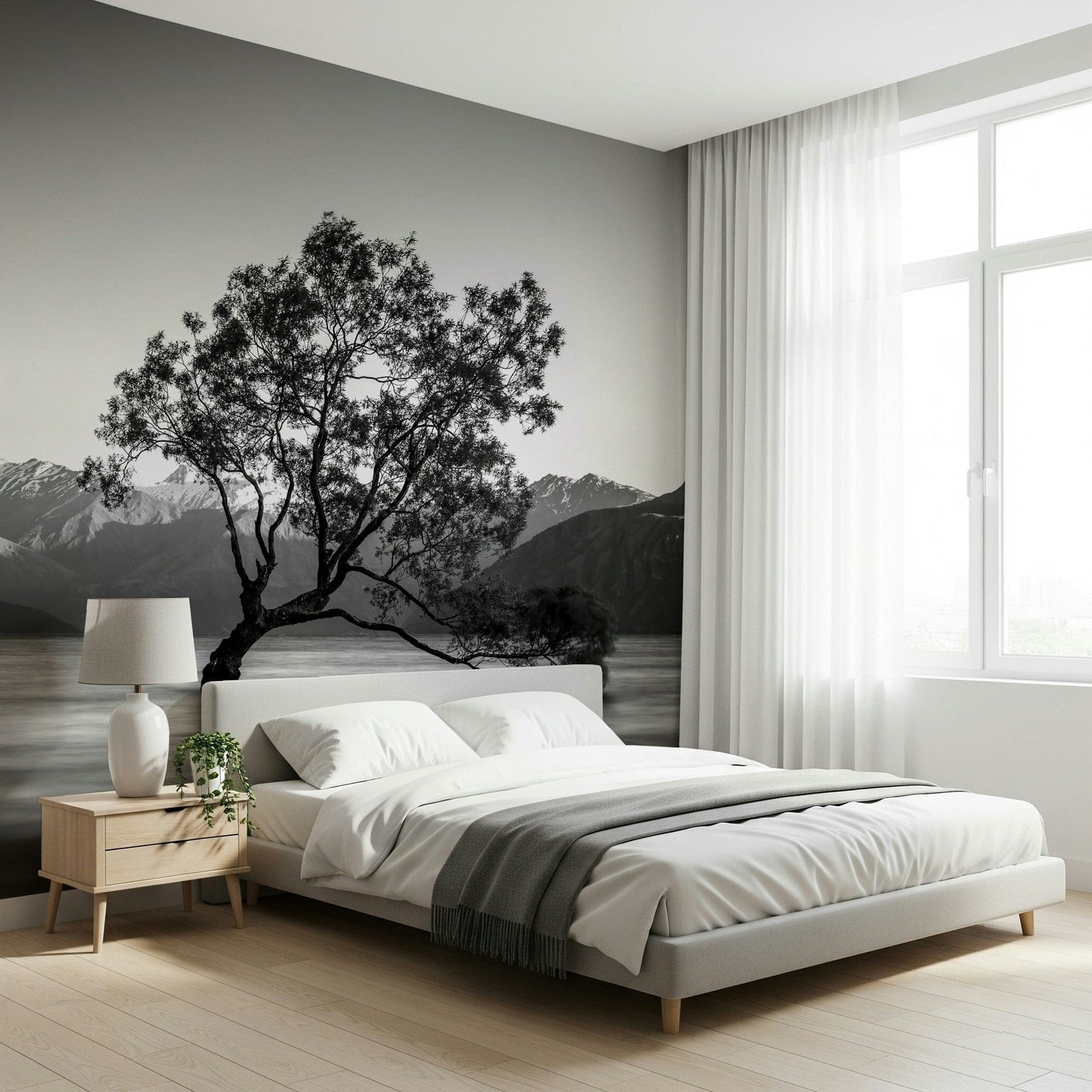 Lonely tree silhouette against bright sky in Solitary Woodland wallpaper print.