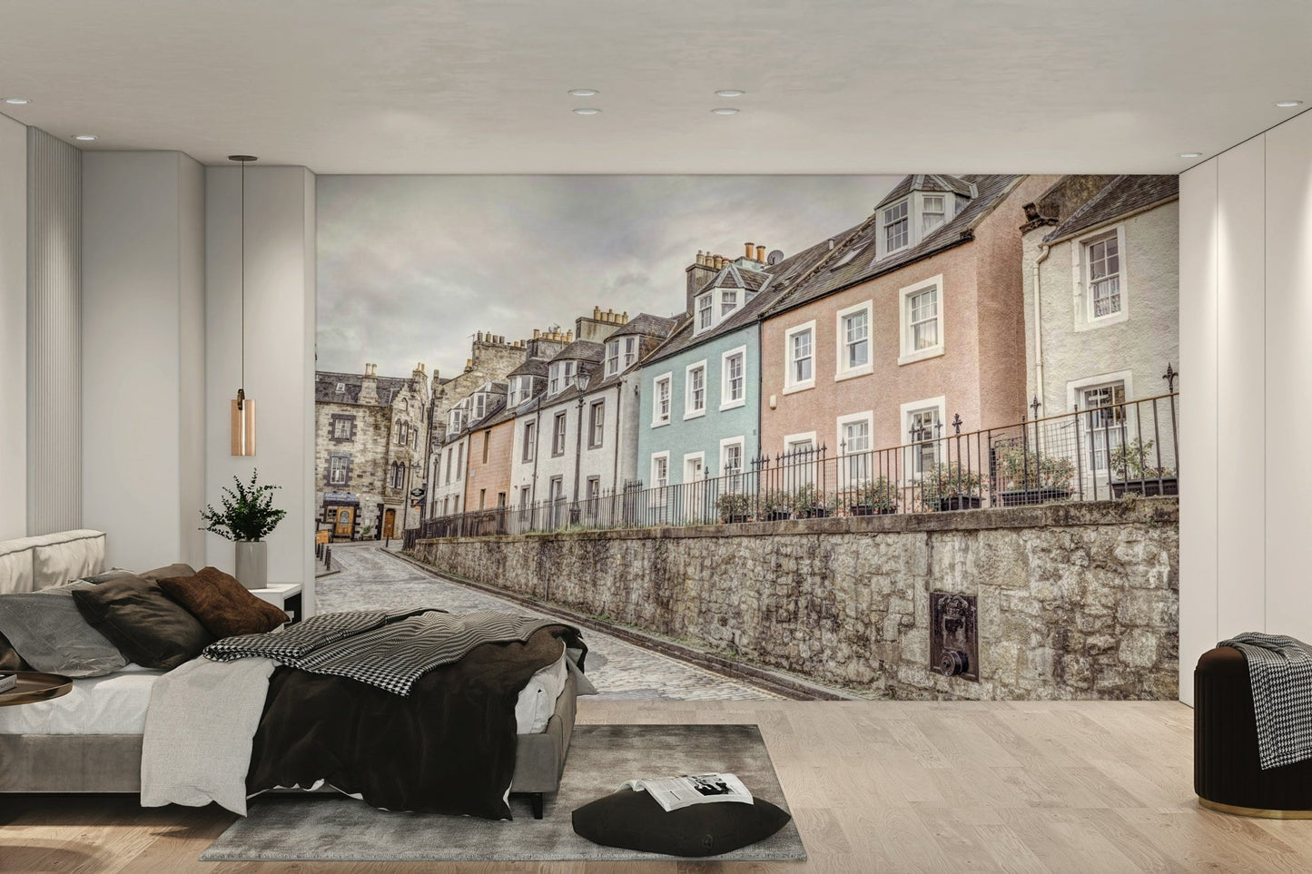 Pastel-colored homes on a cobblestone street

