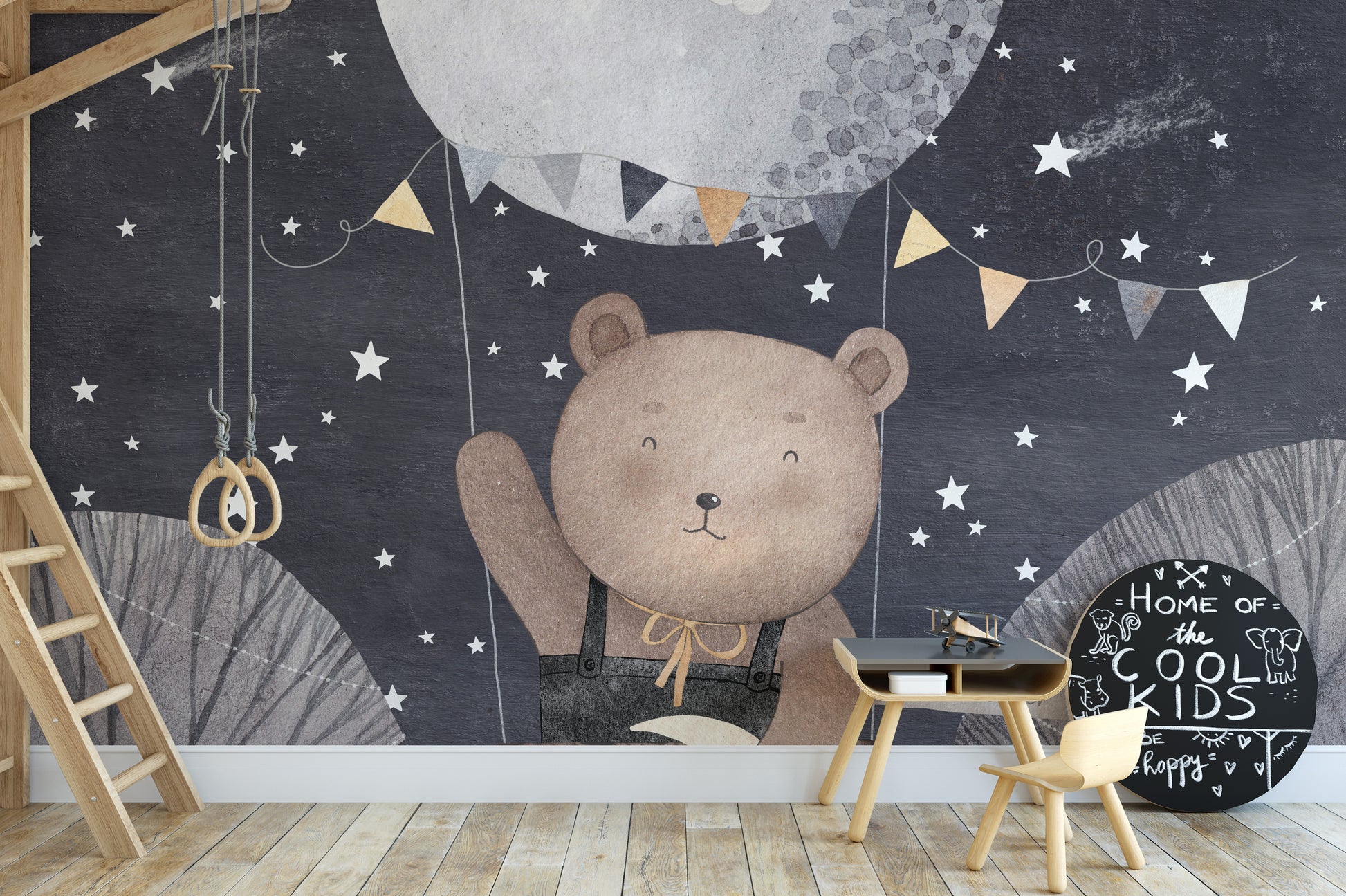 Dreamy starry night mural with a playful bear and floating balloon.

