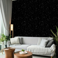 Celestial themed wall mural with gold stars for a cozy master bedroom feature wall.
