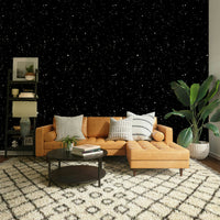 Starry Night Symphony Wallpaper used as a focal point in a studio apartment lounge.