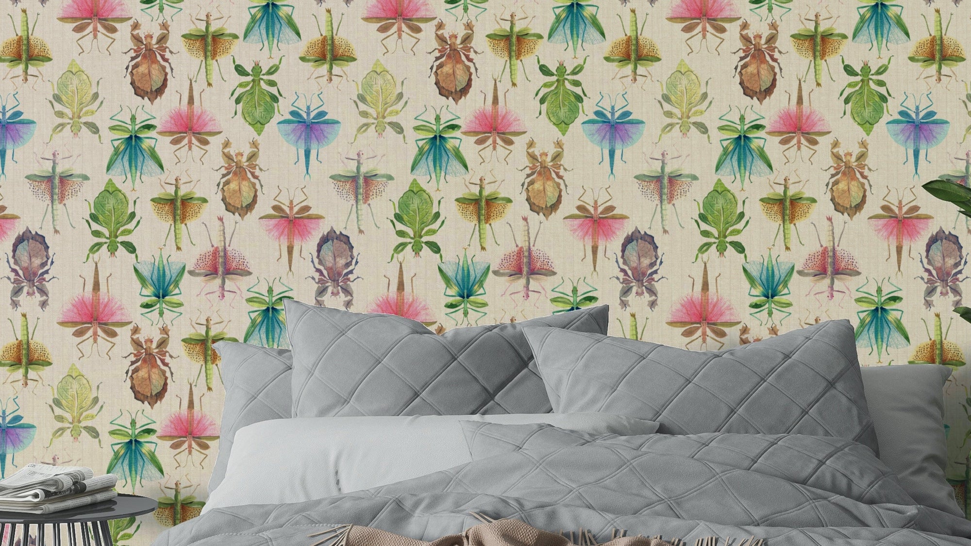In Plain Sight Stick and Leaf Insects in Camouflage wallpaper behind a bed with gray quilted bedding