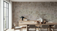 Textured wall mural with mosaic stone patterns creating a rustic and artistic accent wall.