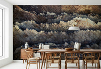Earth-toned stratified stone wall mural creating a grounded, textured, and timeless interior look.