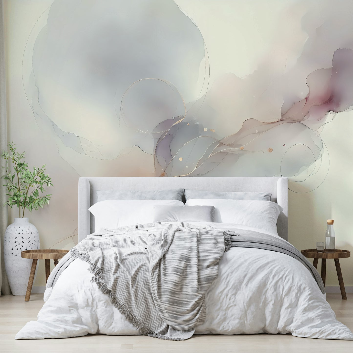 Studio apartment with a serene light-colored landscape mural.