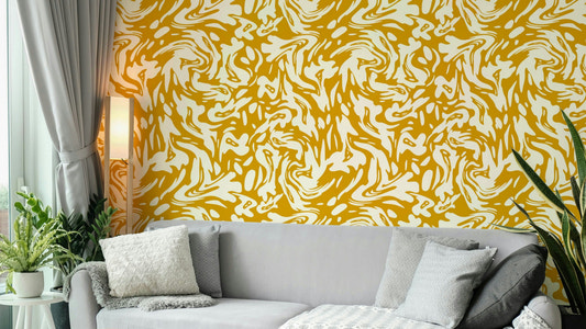 Close-up of a warm, swirling pattern on a mural


