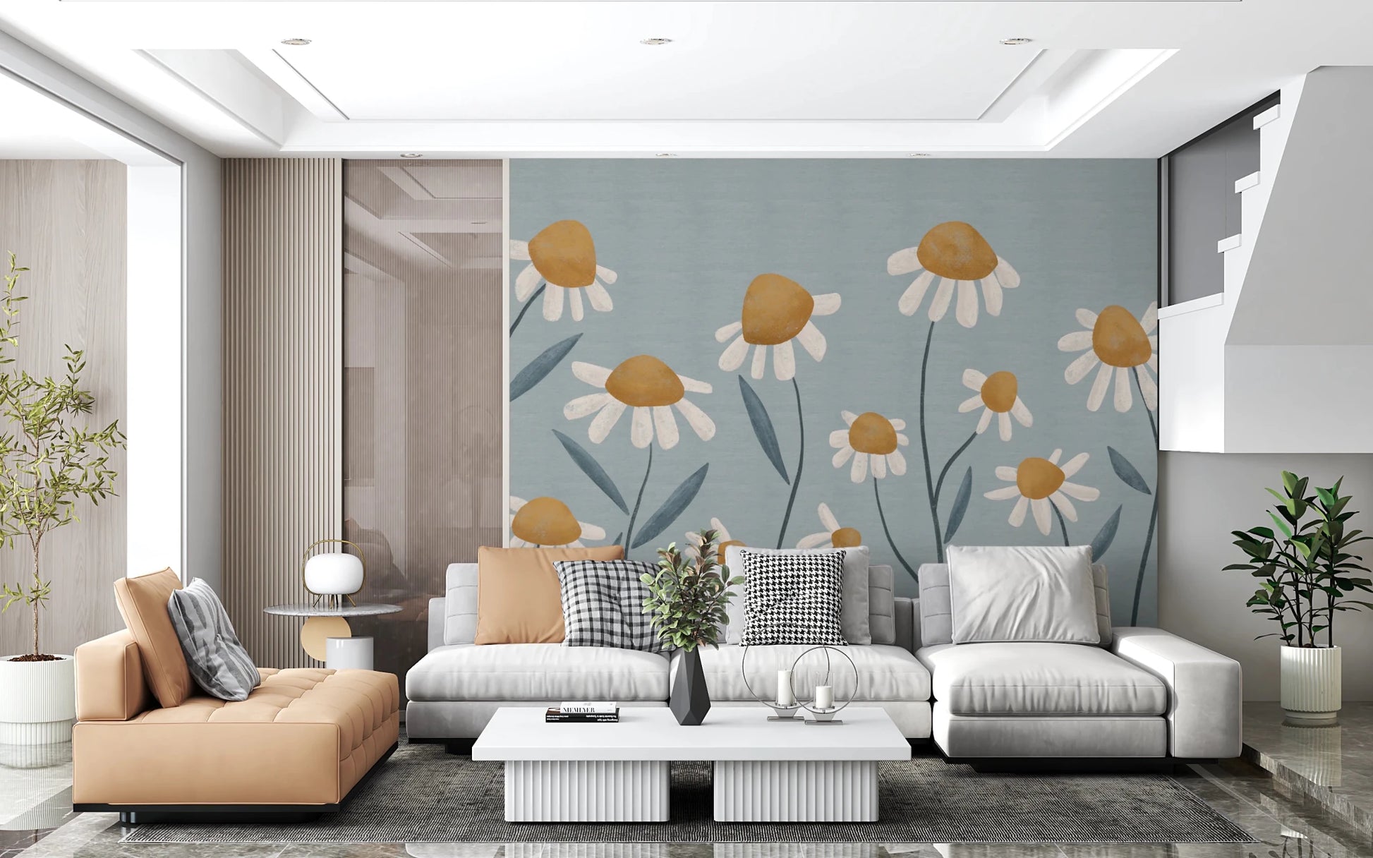 Sunny Daisy Field wallpaper mural of mustard daisies on blue behind a grey sectional and tan chaise in a living room