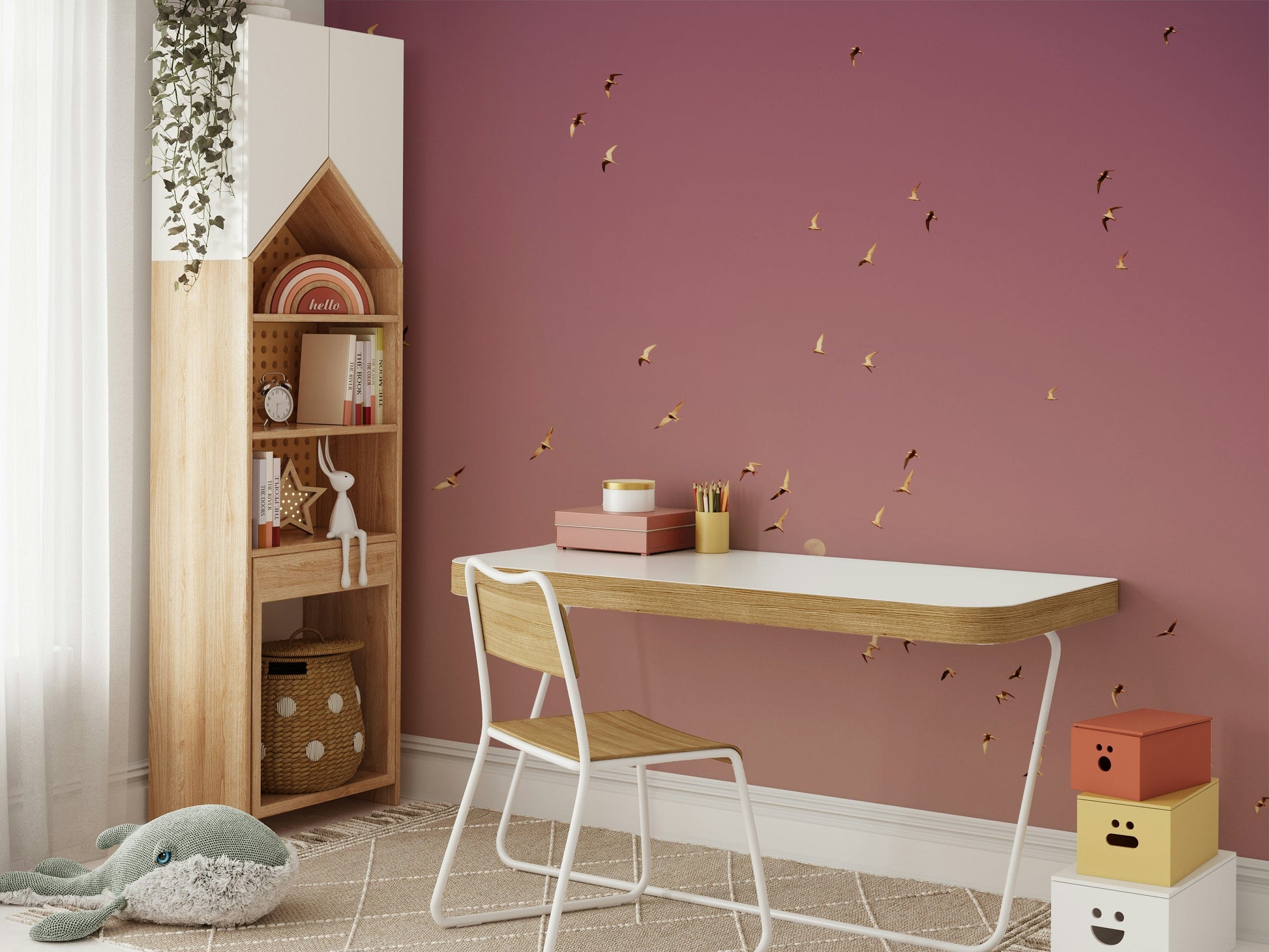 A beautiful flock of birds flying across a pink sky.

