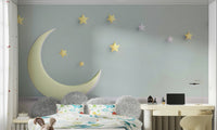 Nursery wall mural showing crescent moon and twinkling stars

