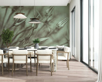 Modern dining space with muted green floral wall mural