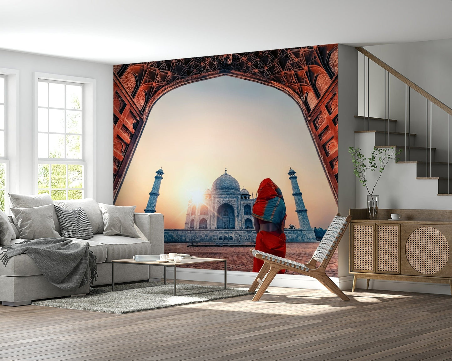Grand arch framing Taj Mahal at sunset wall mural serene peaceful atmosphere.
