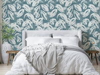 The image features stylized or abstract leaf shapes in various sizes.
