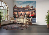 Grand temple wall mural defines sofa backdrop