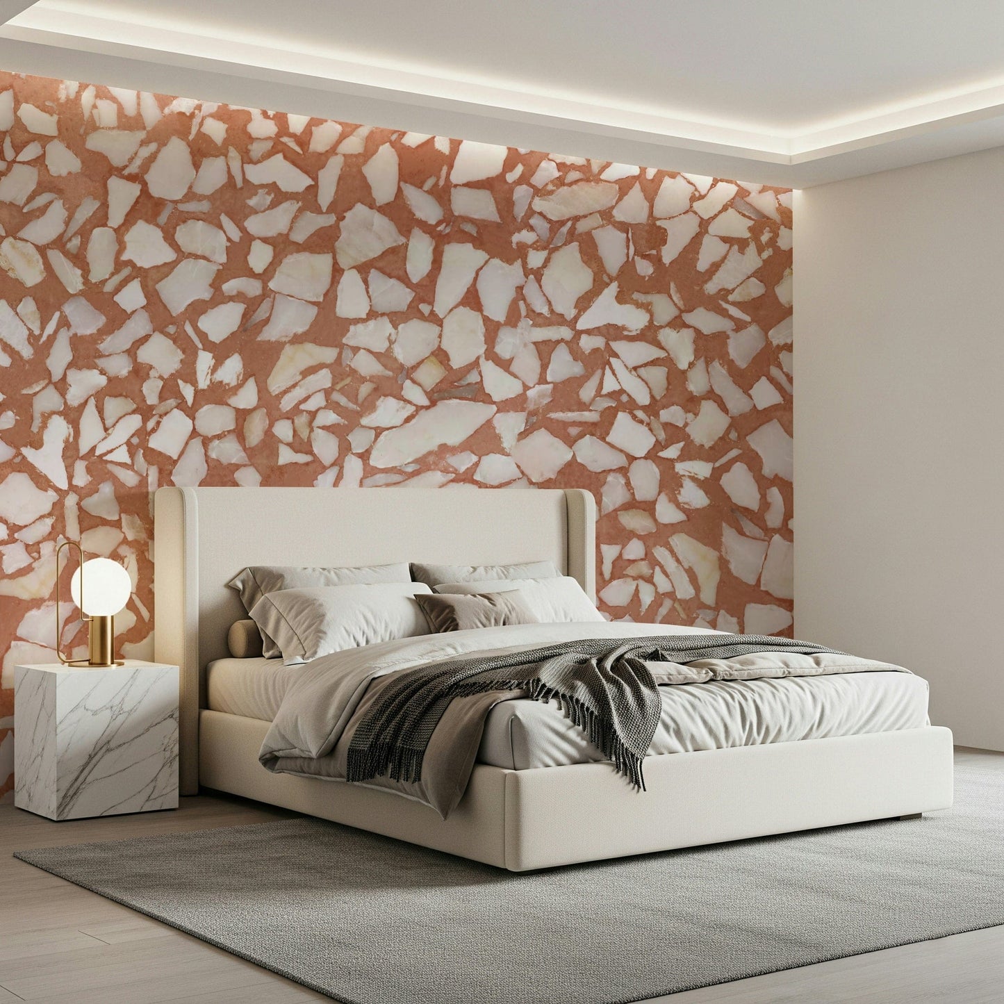 Clay-toned stone terrazzo wall mural. Bright contrasting flecks.