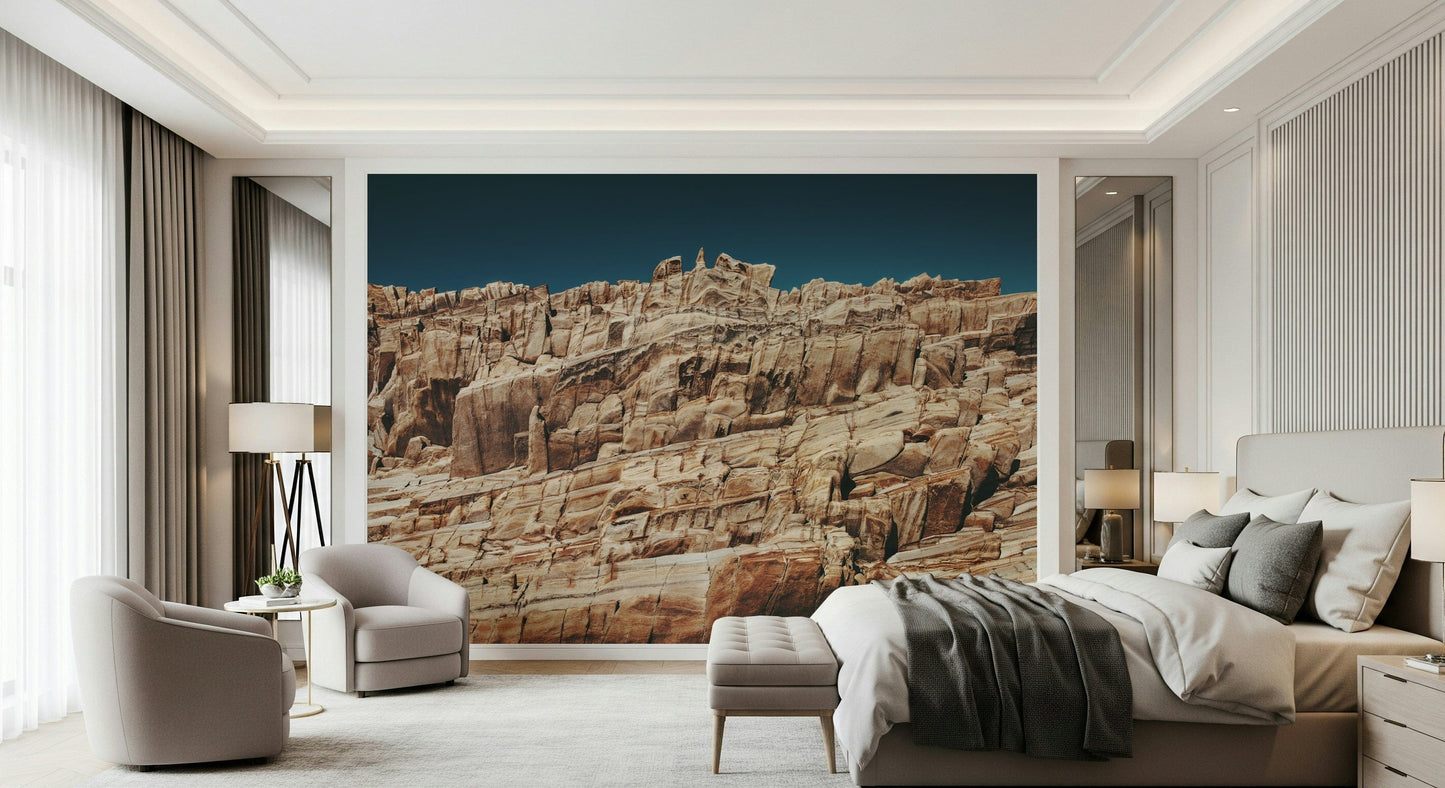 Rustic terracotta cliffscape wallpaper mural bringing outdoor textures and warm tones indoors.