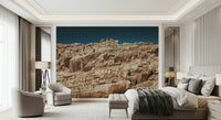 Rustic terracotta cliffscape wallpaper mural bringing outdoor textures and warm tones indoors.