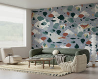 An artistic contemporary speckled mural on minimalist wallpaper.
