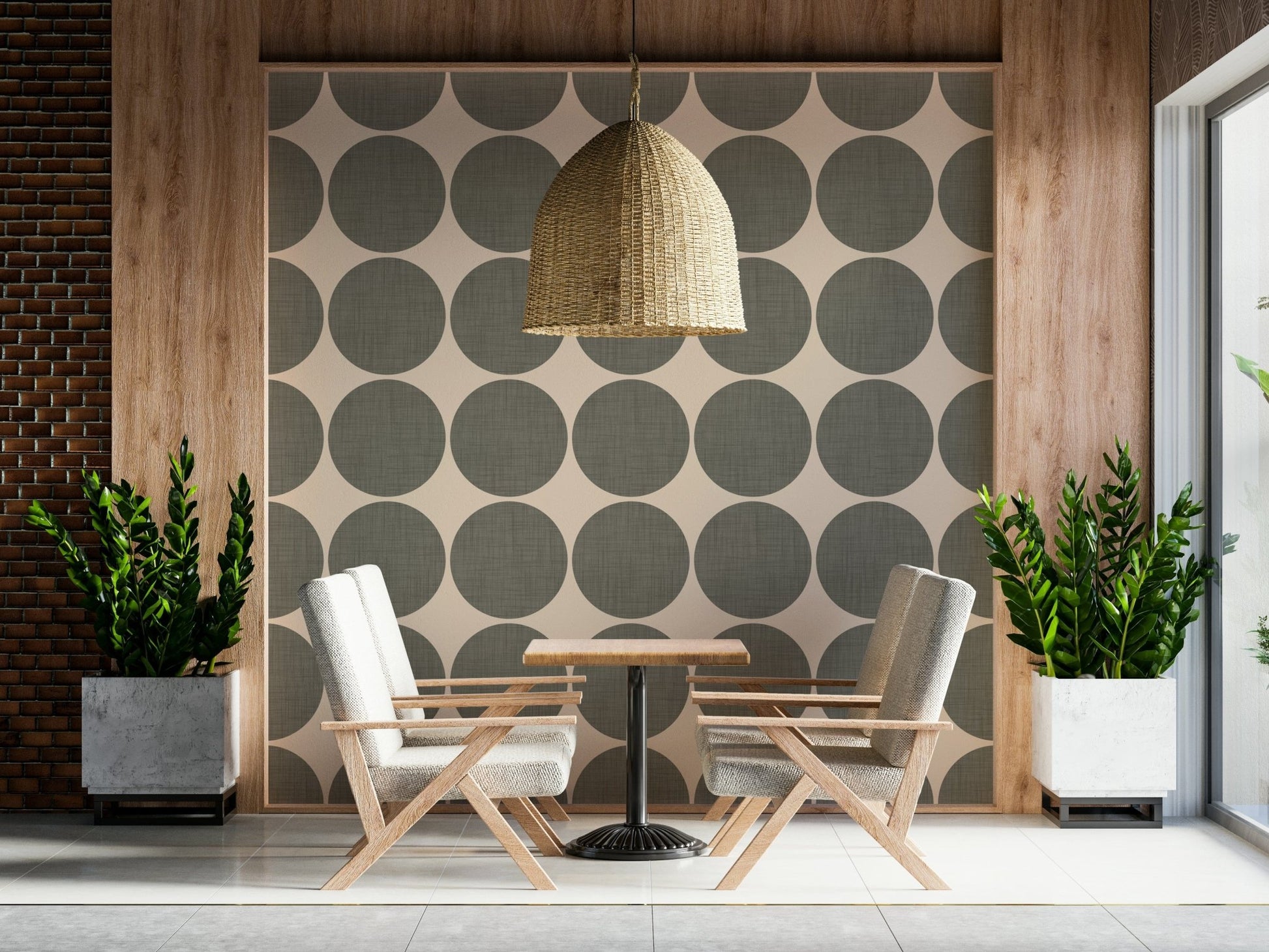 Cream wallpaper decorated with large muted green circles that have a subtle fabric-like texture