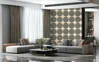 Simple geometric pattern with uniform green circles contrasting against an off-white background