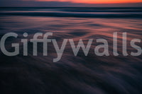 A detail of the warm tones in the water and sky.

