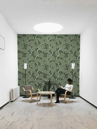 Floral wallpaper with a mix of green and white.

