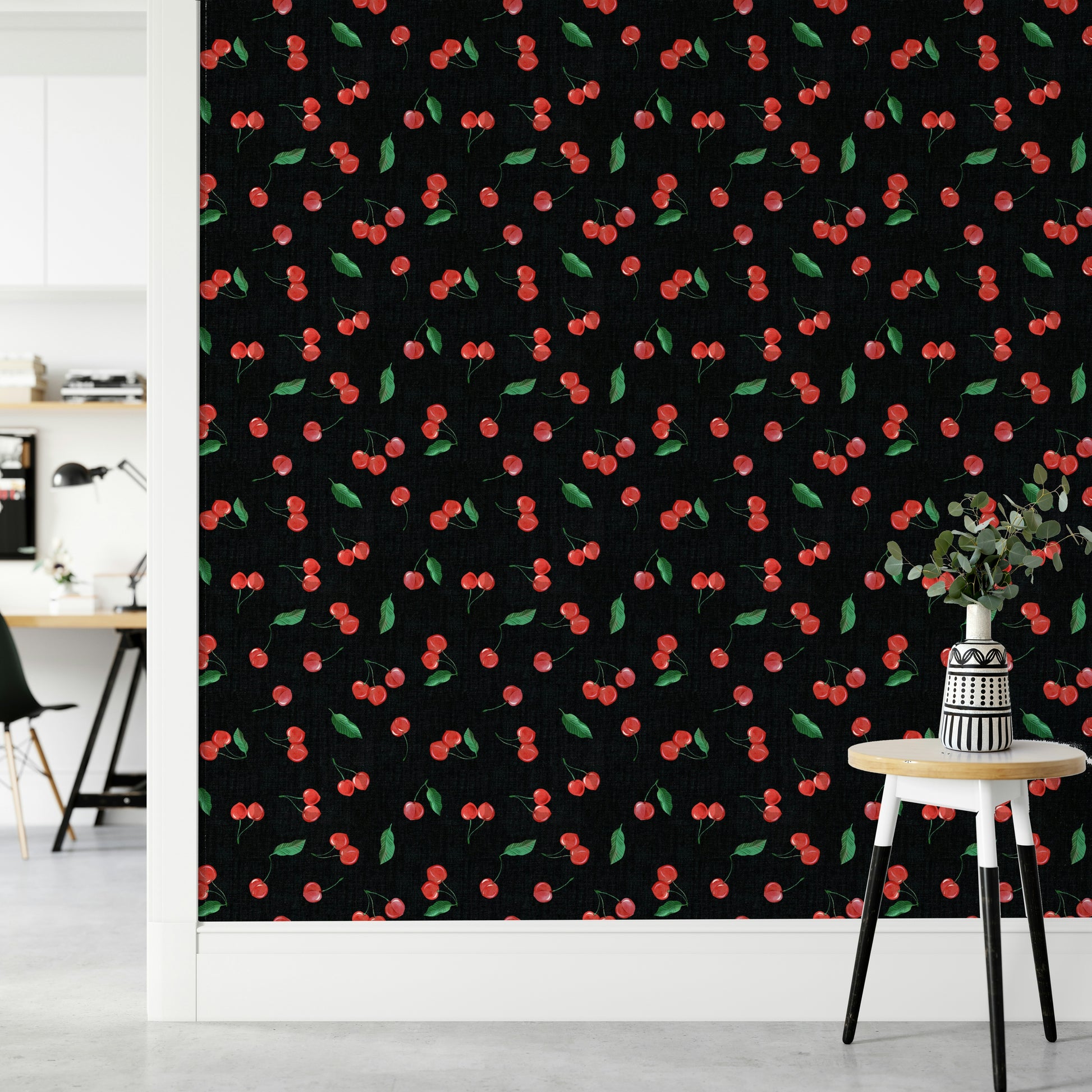 Bold black fruit wallpaper with painterly cherries

