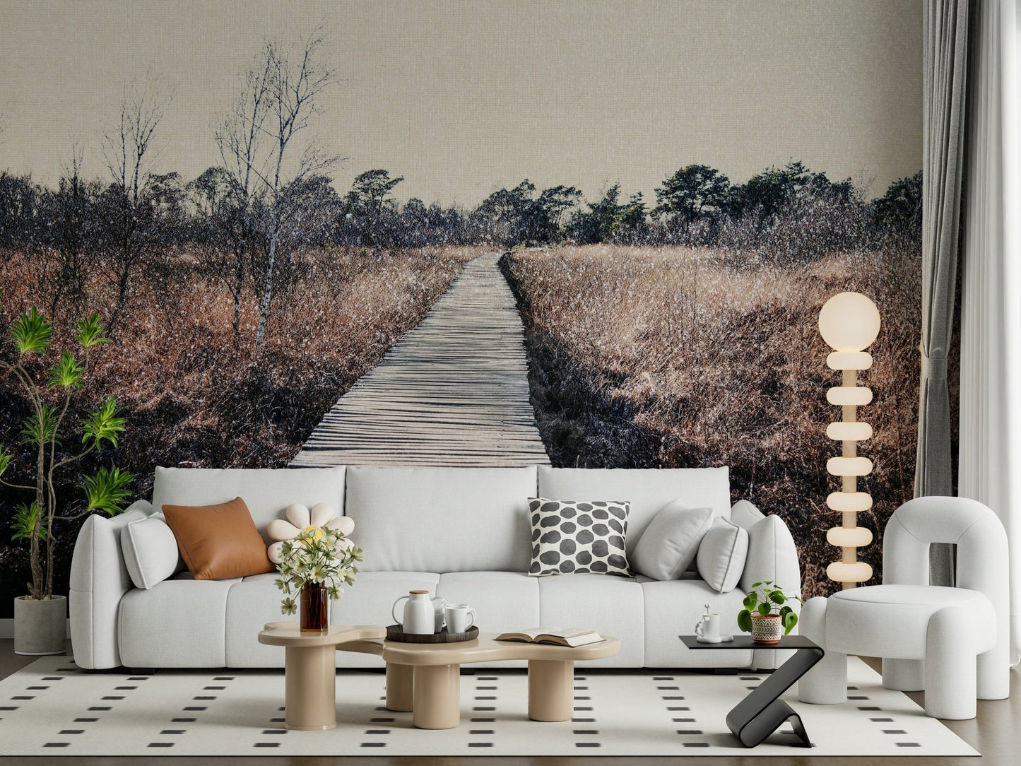 Trail's End Serenity Wall Mural behind a gray sofa in a bright urban apartment.