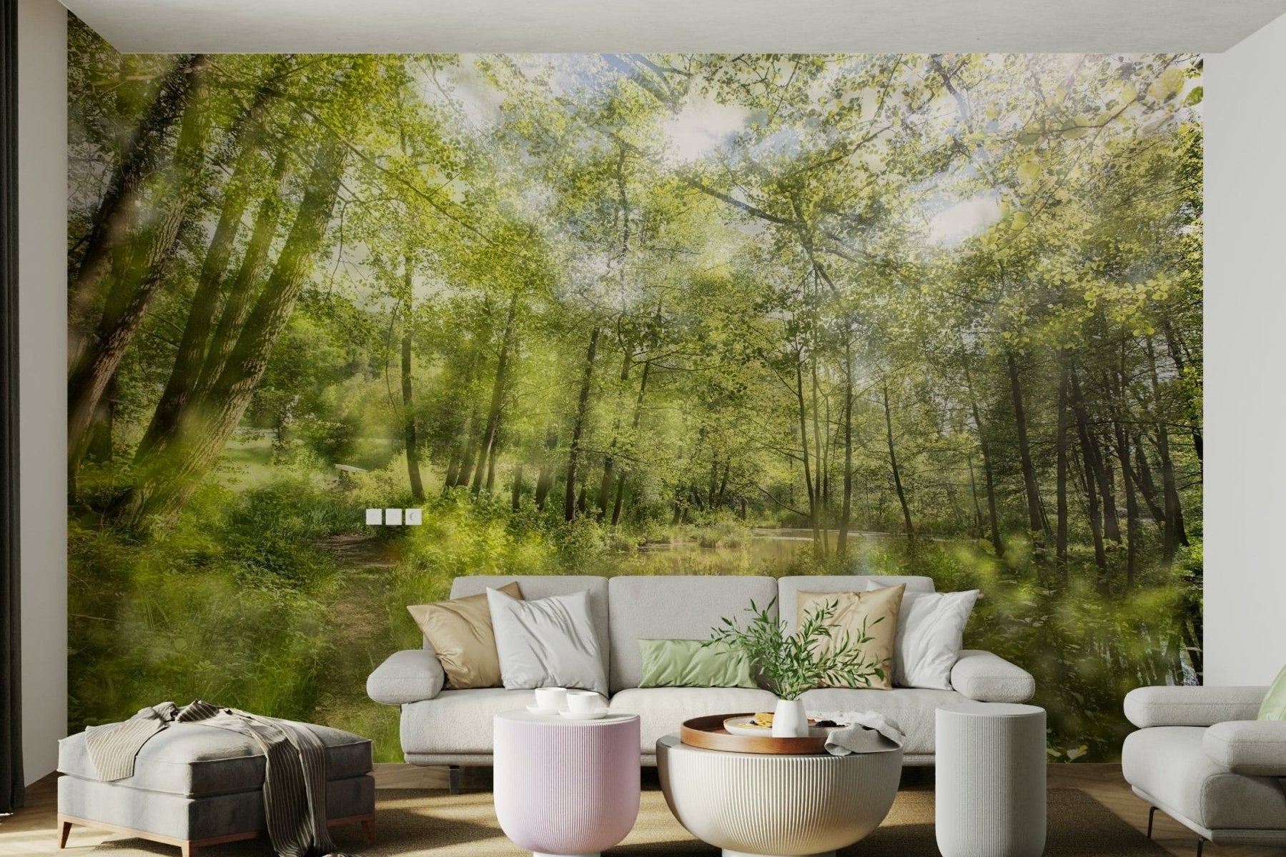 Tranquil Forest Reflection wall mural of a sunlit green wood behind a grey sofa with sage pillows and drum tables