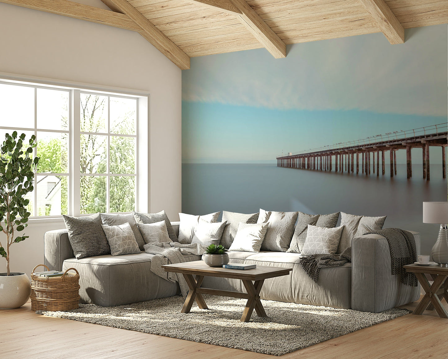 A contemporary living room with a large serene wharf wall mural.


