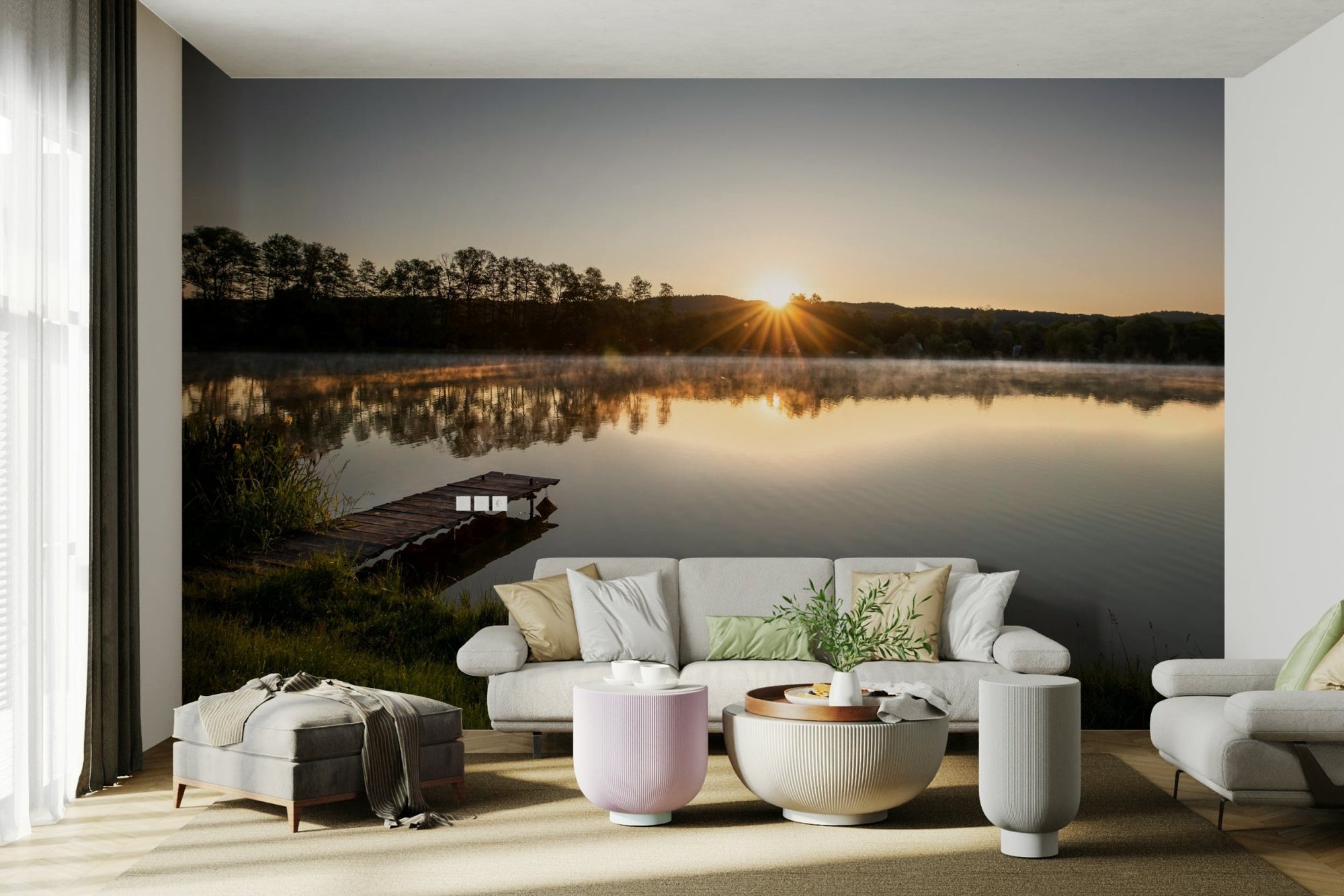 Tranquil Sunrise Reflection lake wallpaper mural with a wooden jetty behind a white sofa and ottoman in a living room