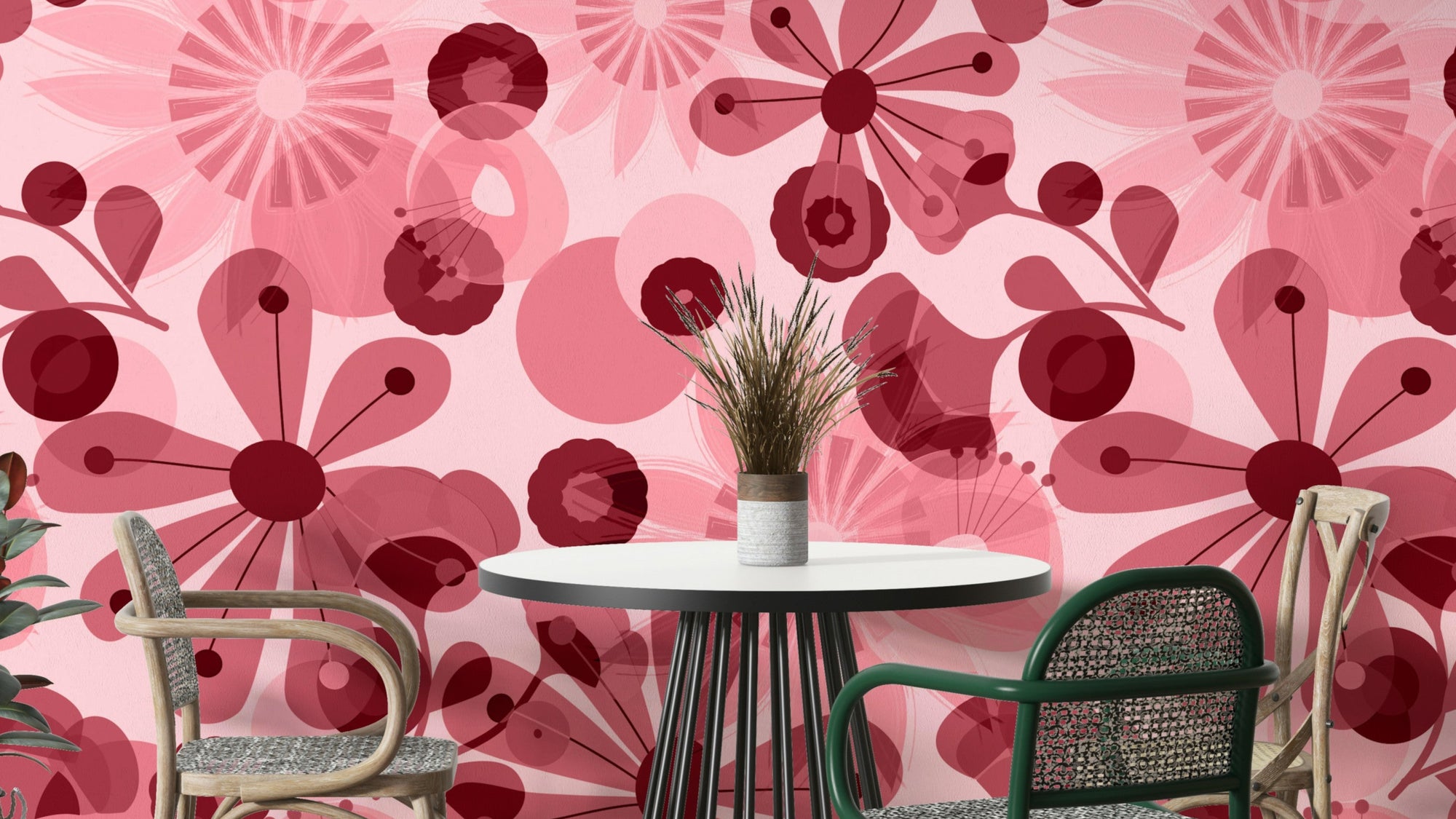 Translucent Flora wallpaper mural with crimson and pink retro flowers behind a white round dining table