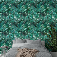 A dining area with a green accent wall

