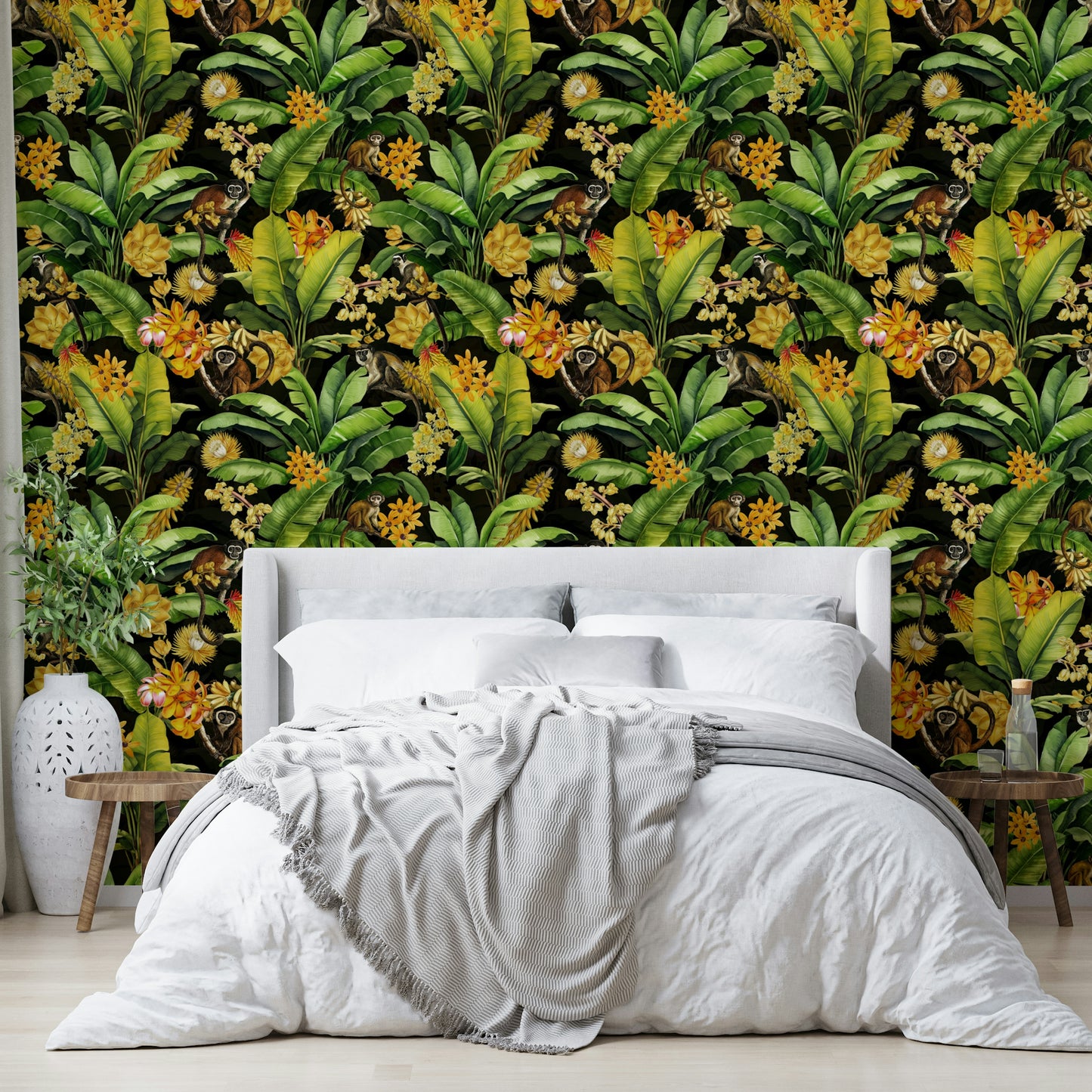 Jungle-inspired mural with playful primates and lush botanical details.

