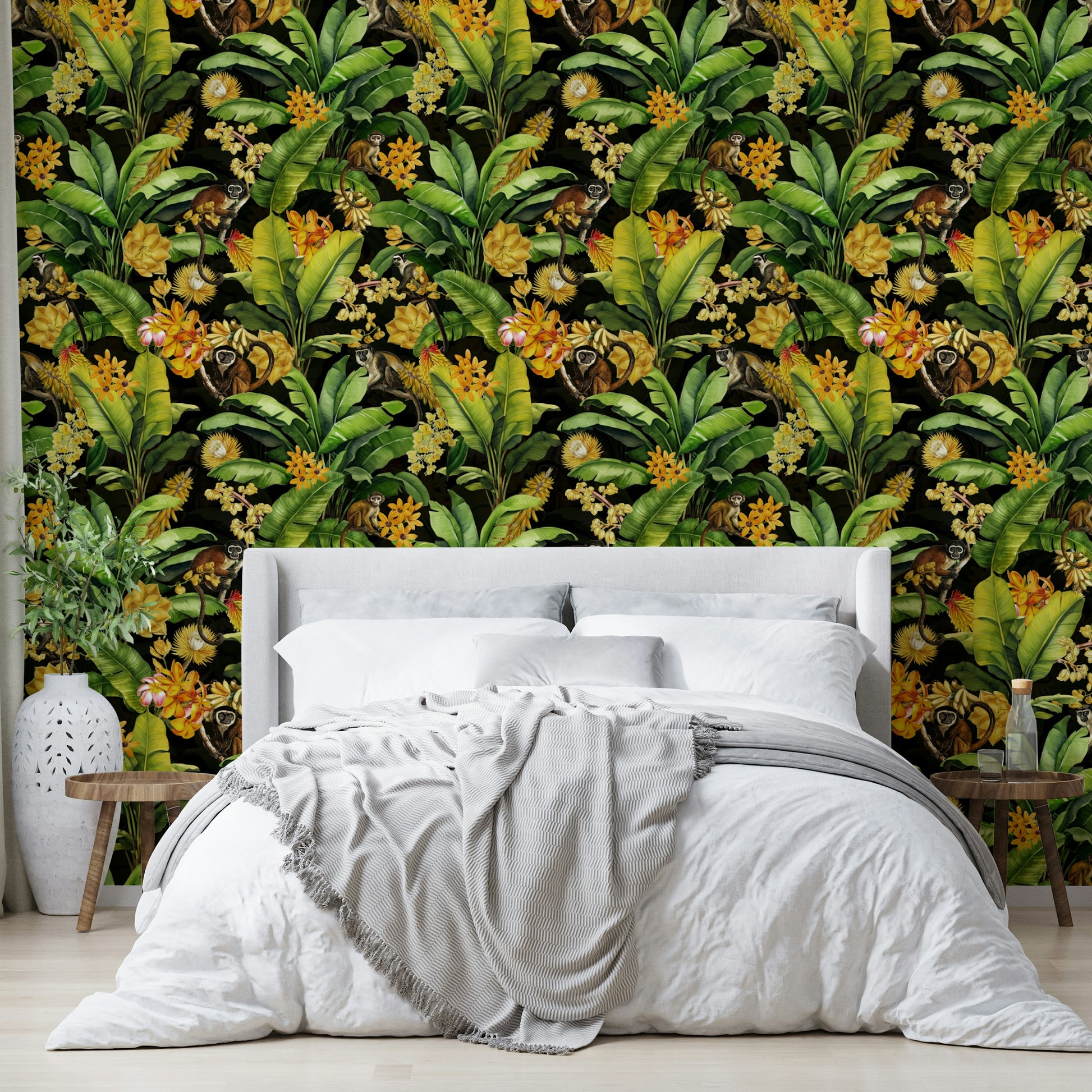 Jungle-inspired mural with playful primates and lush botanical details.

