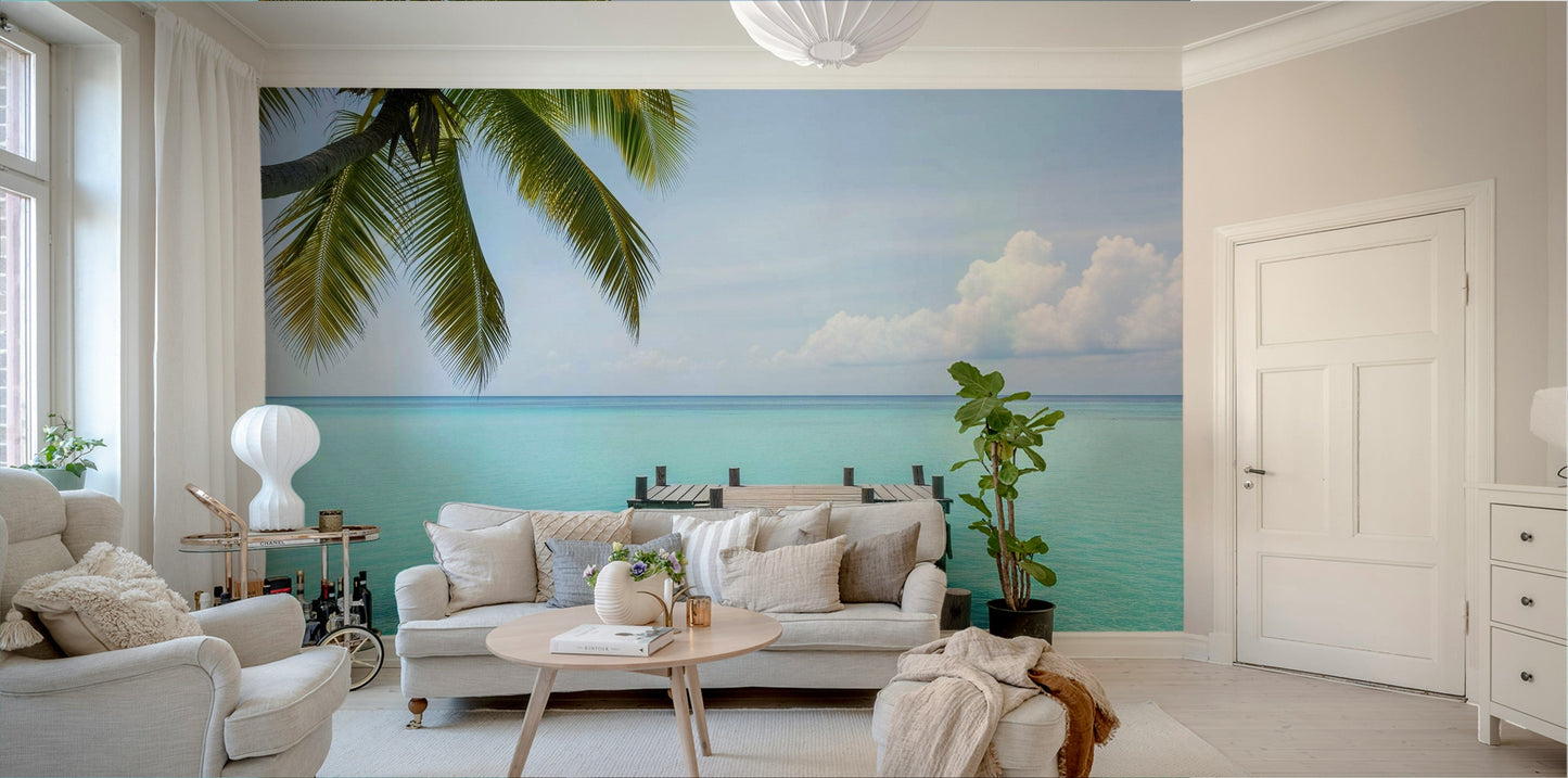 The sky is a clear, light blue with a few fluffy clouds.
