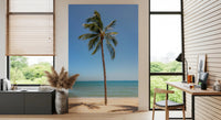 Tropical Retreat wallpaper mural of a tall palm and sea behind a wood desk in a slat-walled home office