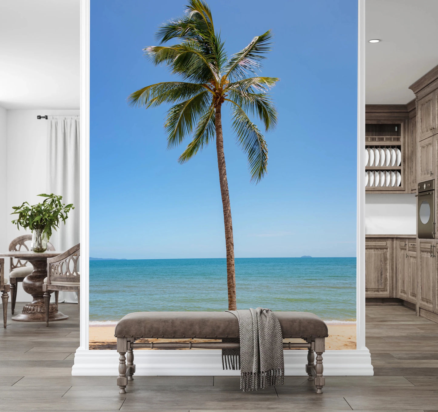 Tropical Retreat wallpaper mural of a beach palm tree above an upholstered bench in a bright hallway