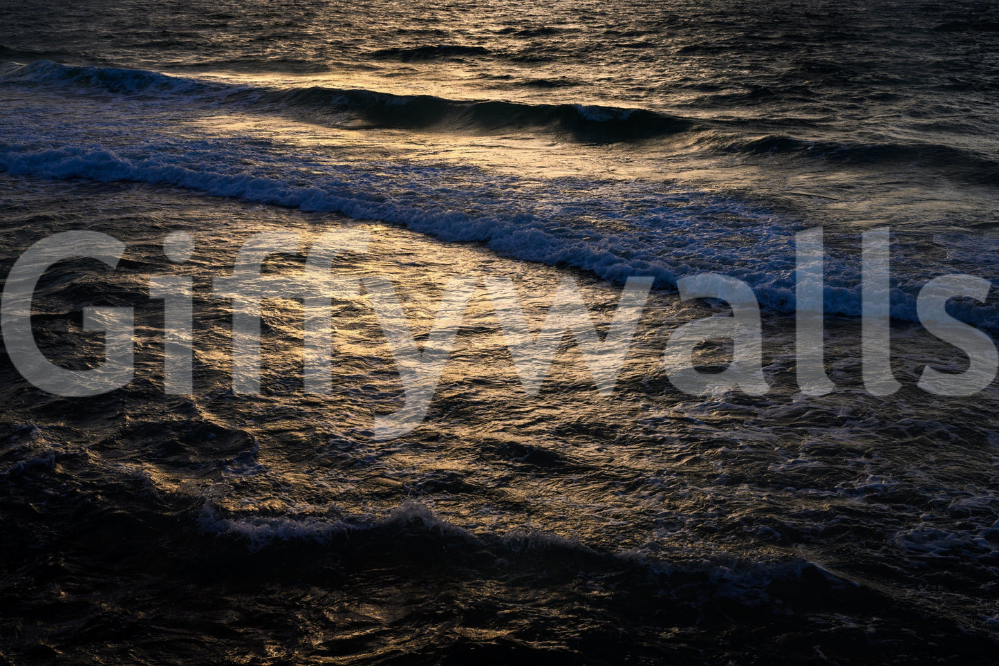 A detail of the warm tones in the rock and water.

