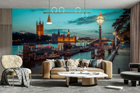 Twilight Thames Embrace wallpaper mural of the lit London skyline and Big Ben behind a camel sofa in a modern living room