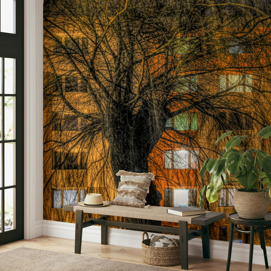 Urban Nightscape Tree Silhouette Against Illuminated Building Wall Mural.

