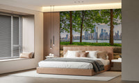 Green trees framing Manhattan architecture wallpaper mural