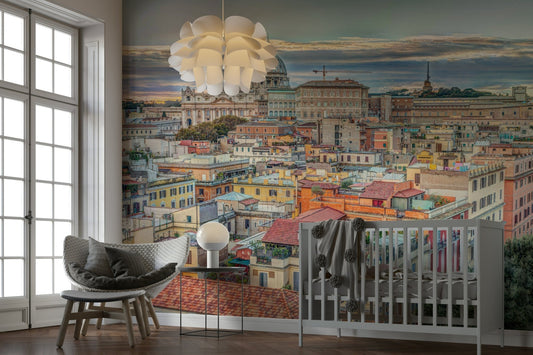 European landscape mural in a bright nursery with a white crib

