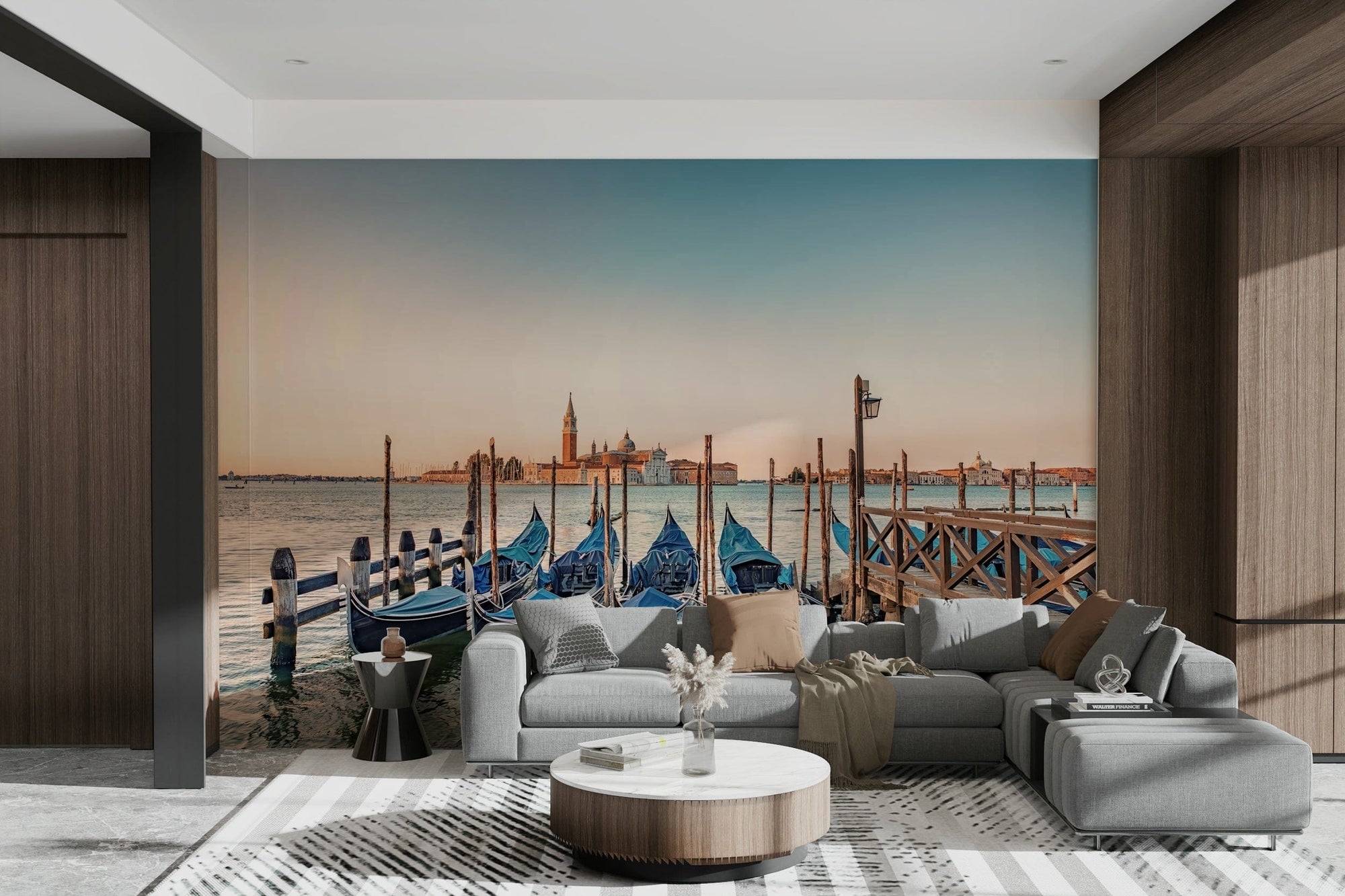 Gondola Dreams wallpaper mural of moored blue gondolas behind a large gray sectional sofa in a living room