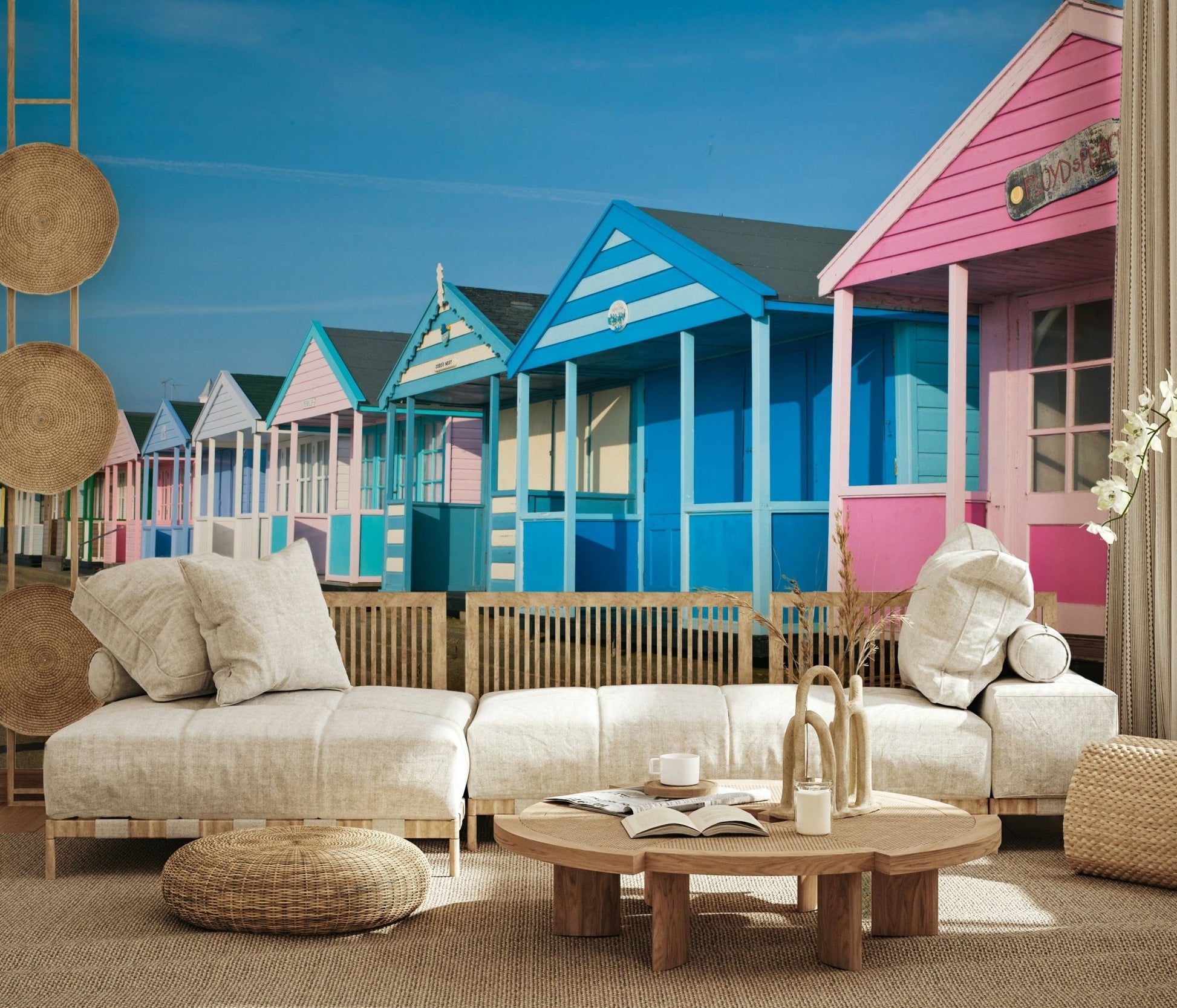 Sunny coastal scene wall mural with huts