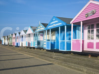 Summer seaside wall mural with colorful huts