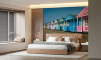 Pink and blue cabins wall mural by shore