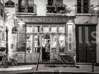 Retro street life depiction wallpaper, dark and moody atmosphere.